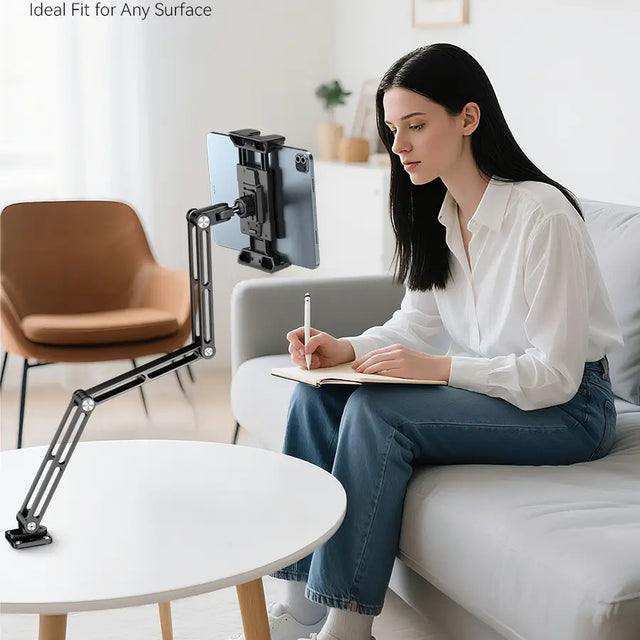 Student using OHLPRO durable tablet holder wall mount at study desk for learning