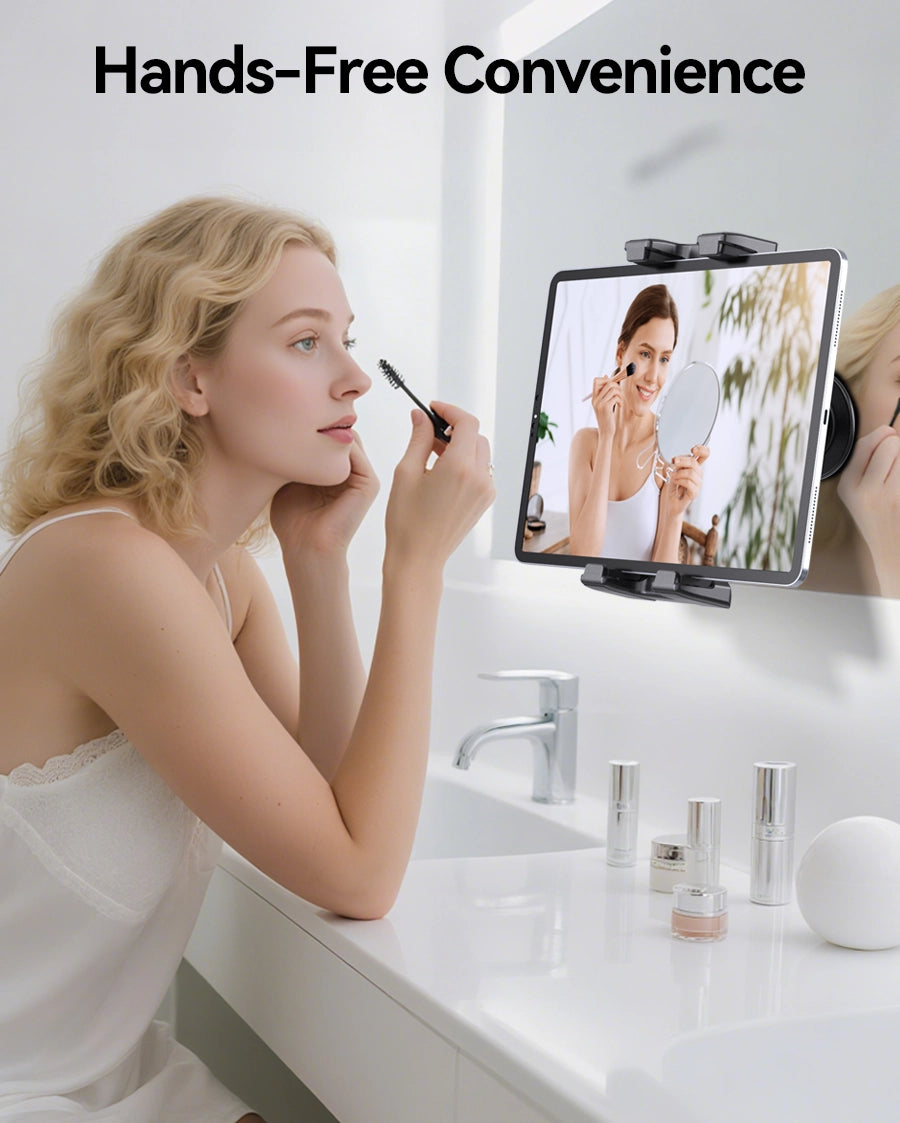 Tablet holder in use on a bathroom mirror  for hands-free makeup viewing
