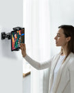 Mounting the OHLPRO tablet holder on the wall with drill base for hands-free viewing